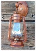 A Old Time Rustic Oil Lantern Electric Wall Sconce