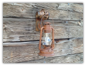 A A Hub and Horseshoe Rustic Wall Sconce